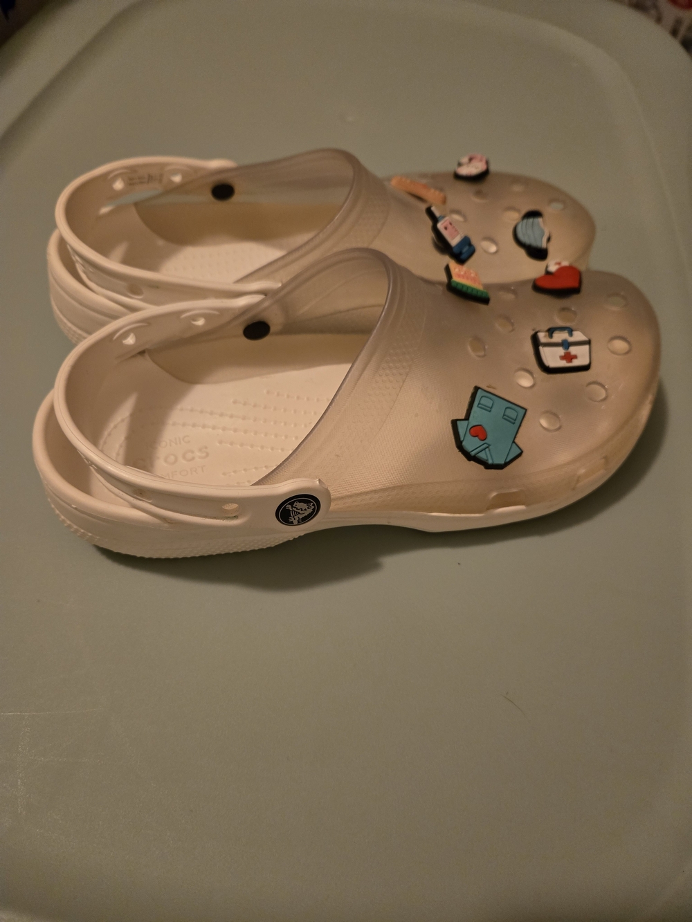 CROCS White Translucent Clog Sandals with Character Jibbitz Included.